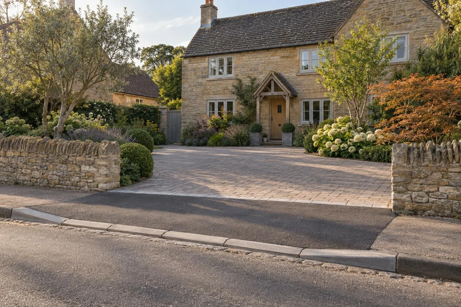 Dropped kerb – limestone cottage Dropped kerb on a limestone cottage, typical of Olney